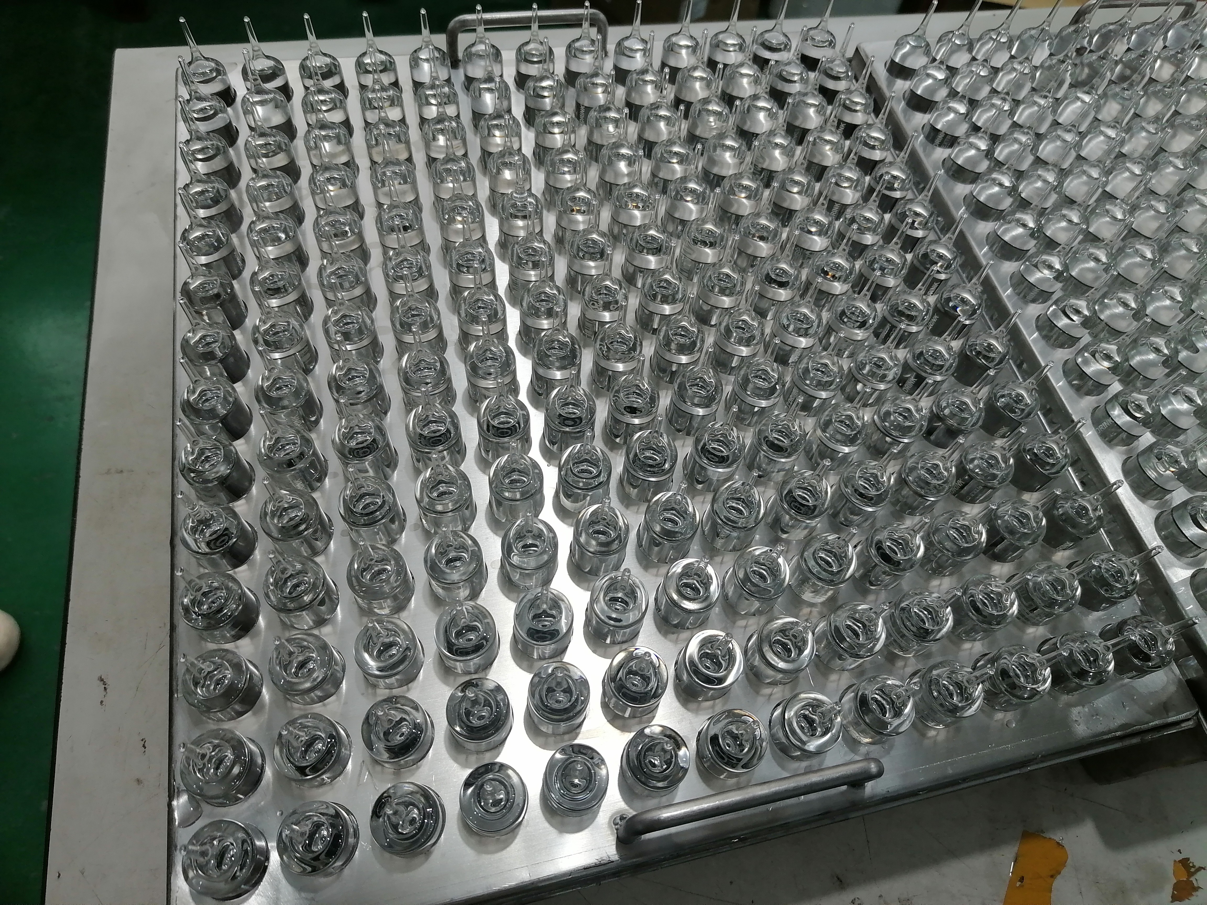 浅析上海圣刚两头尖安瓿瓶真空灌装机核心结构及工作原理